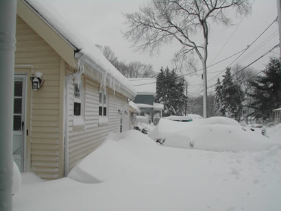 Picture of the front of our new place after the big storm in December